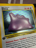 Load image into Gallery viewer, Ditto 3/62 1st Edition Holo Fossil WOTC MP TCGKITTEN